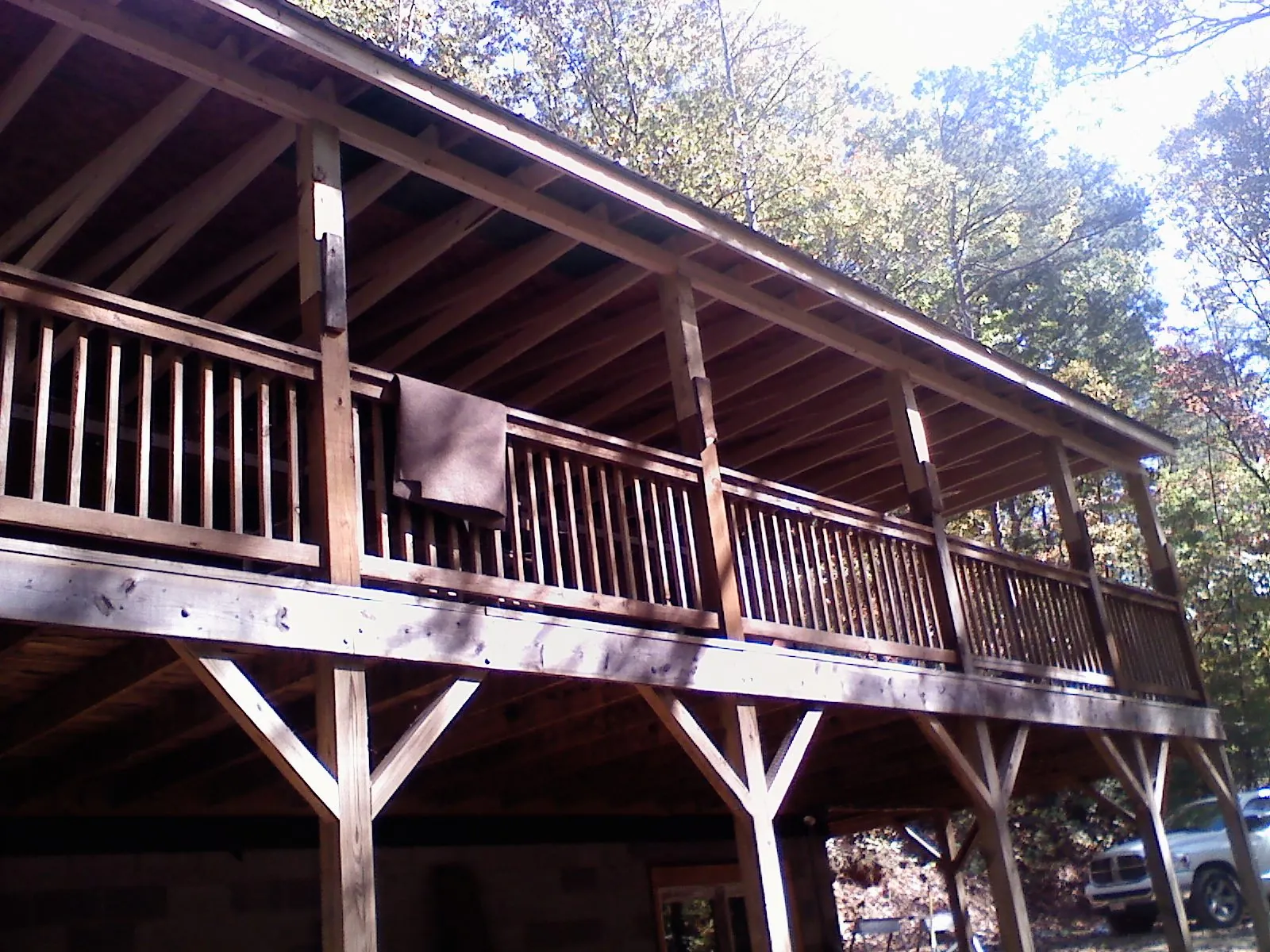 Timber framing under a new elevated porch and deck — Roof Leak Repair in Atwood by Roofing Brothers